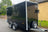 Large black boxxa trailer with twin axles and spare wheel mounted at the front of the trailer.