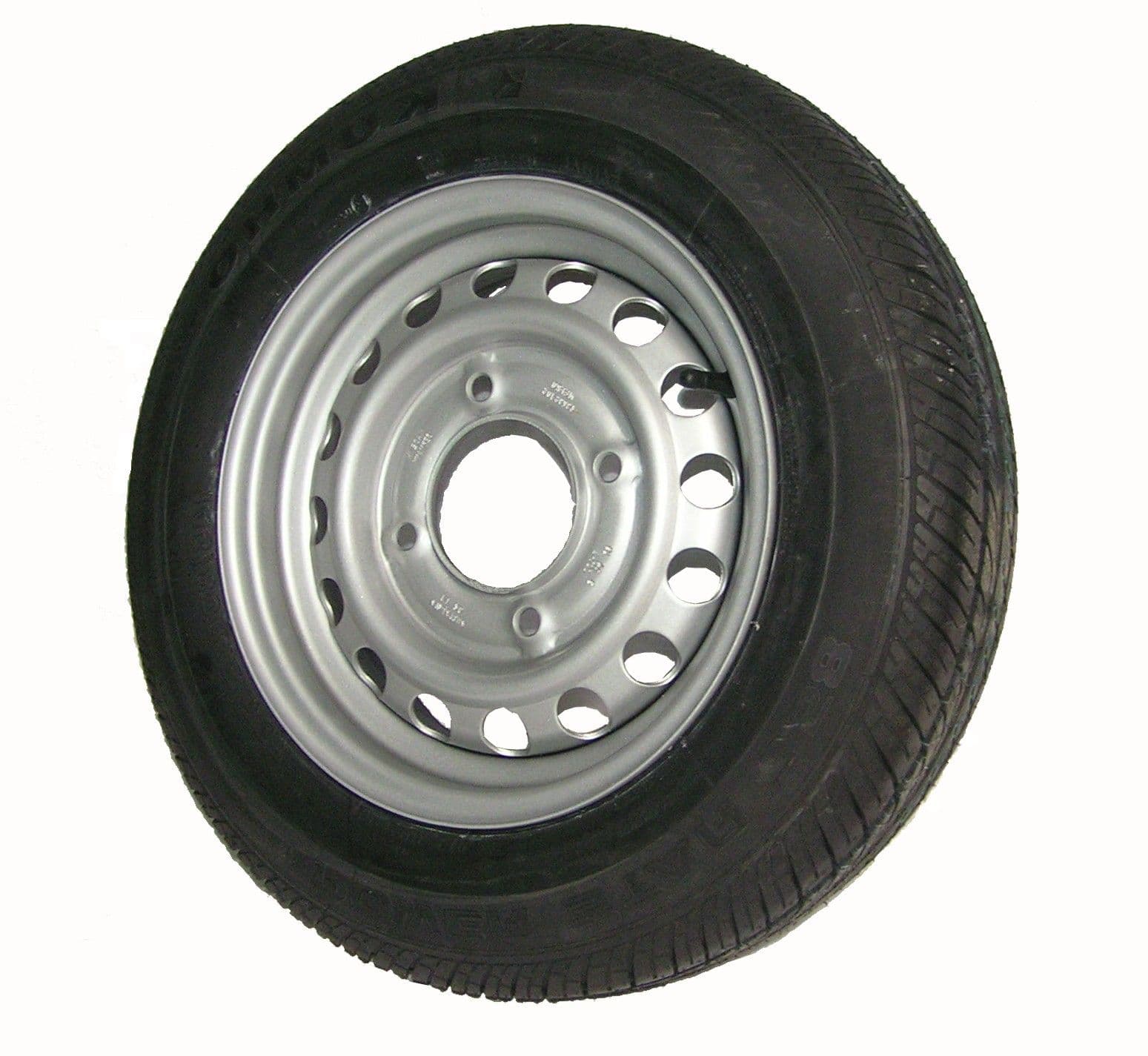 A black tire mounted on a silver steel rim, photographed against a plain white background.